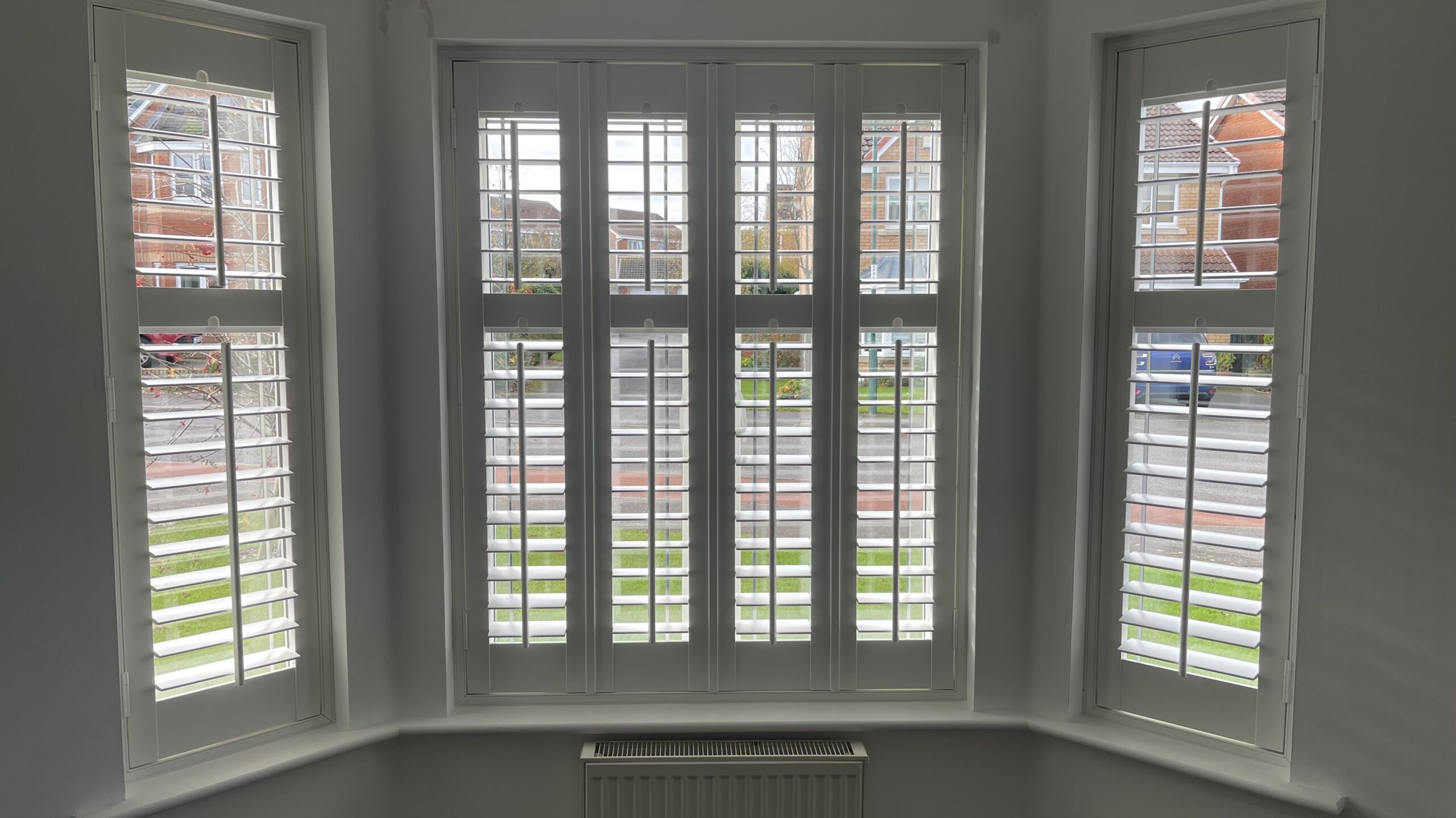 Bay window UPVC Shutters